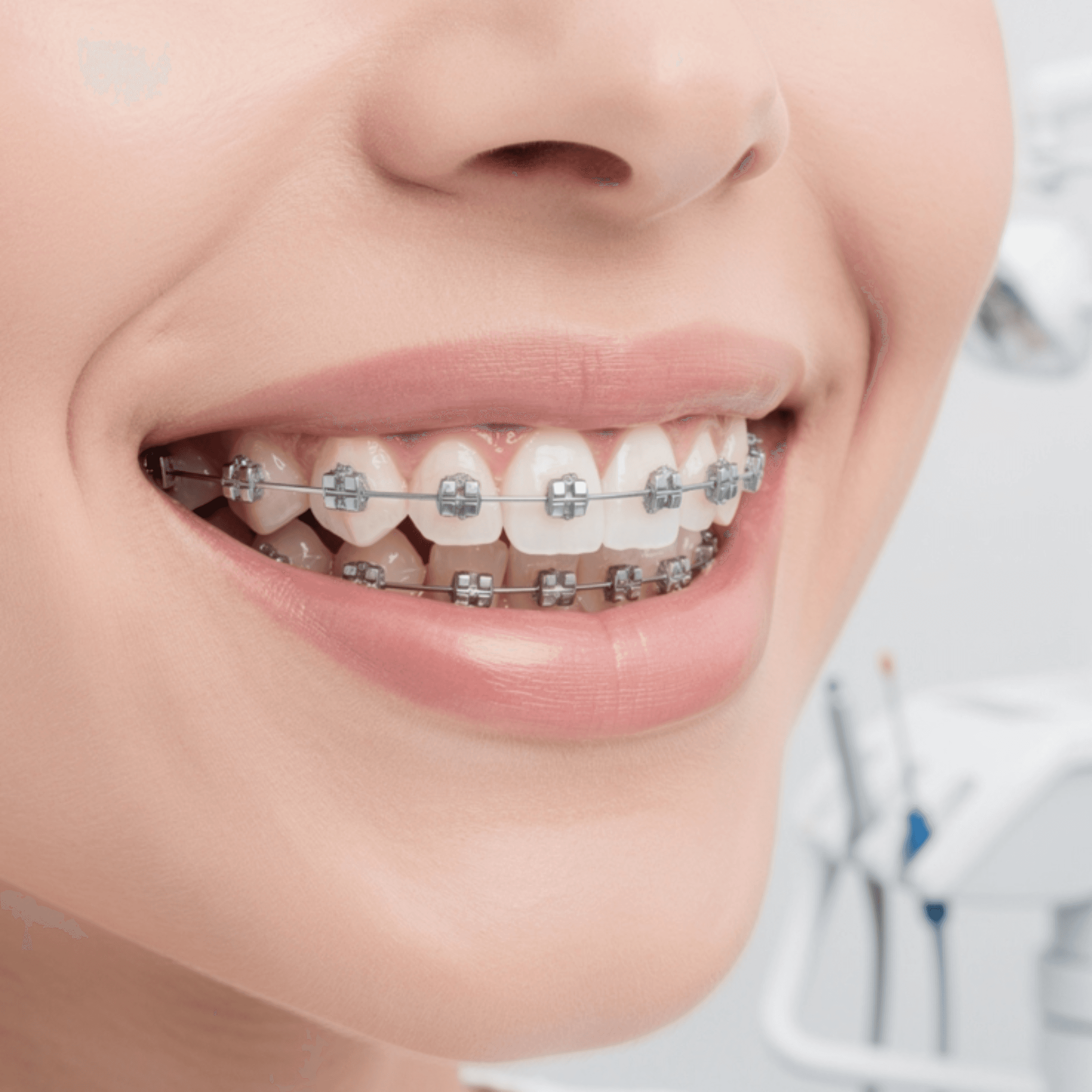 An orthodontist adjusting precision dental braces for a patient to correct alignment and bite